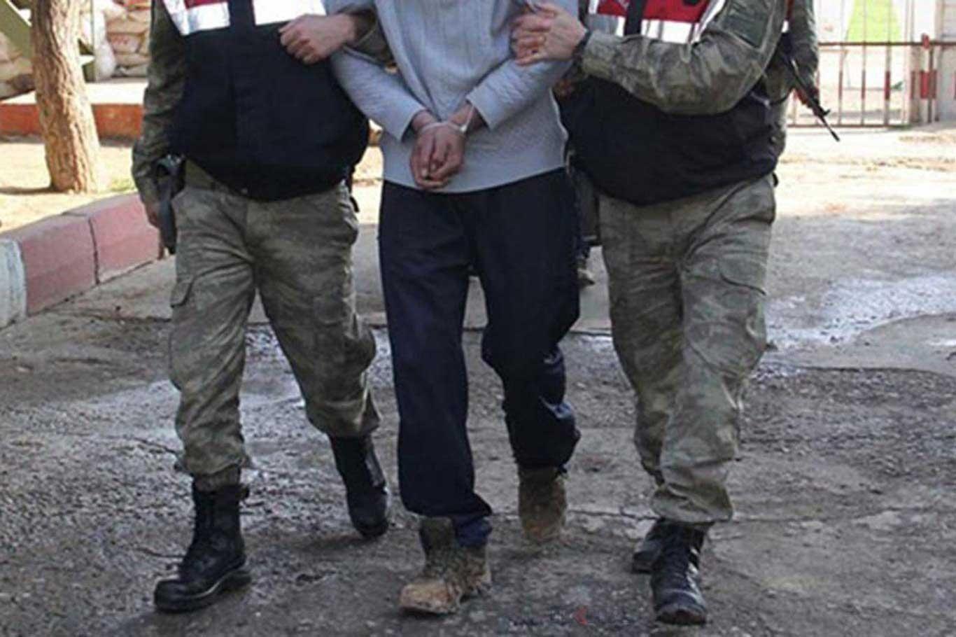 A YPG/PKK member surrenders to security forces in southeastern Turkey